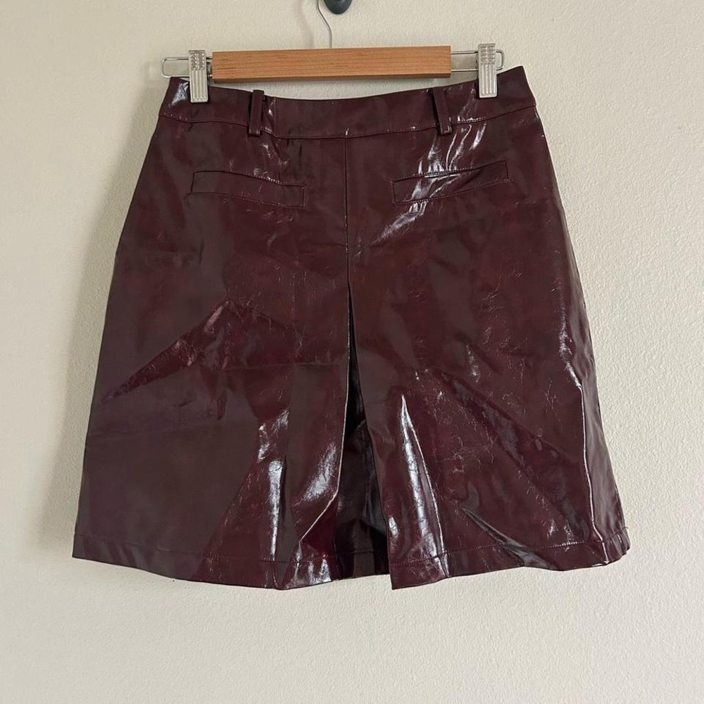 Burgundy faux leather skirt  With‎ belt Commense small